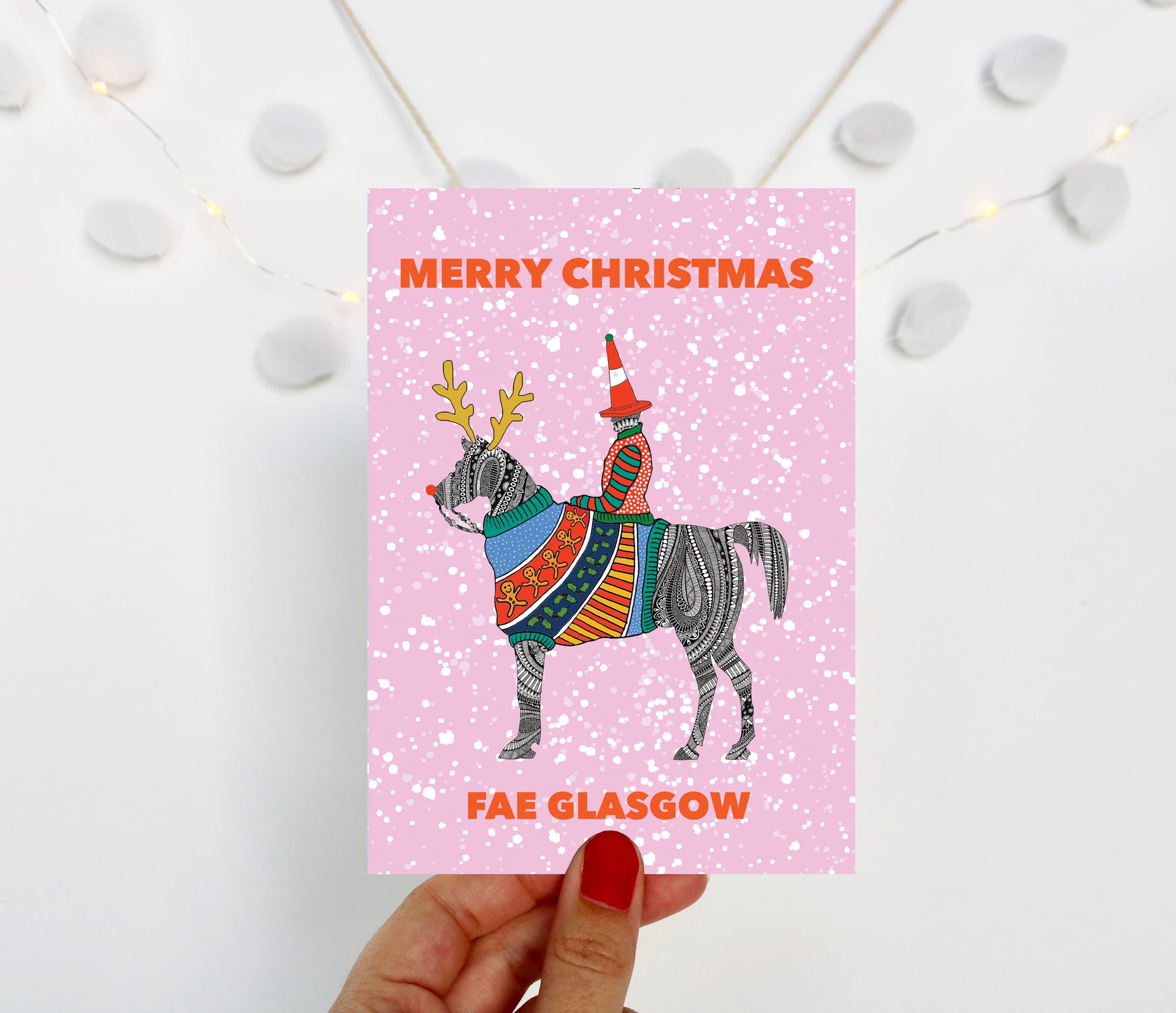 pink-christmas-card-from-glasgow-with-duke-of-wellington-in-christmas-jumper